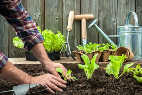 Gardeners Bloomsbury team sorting green waste for recycling